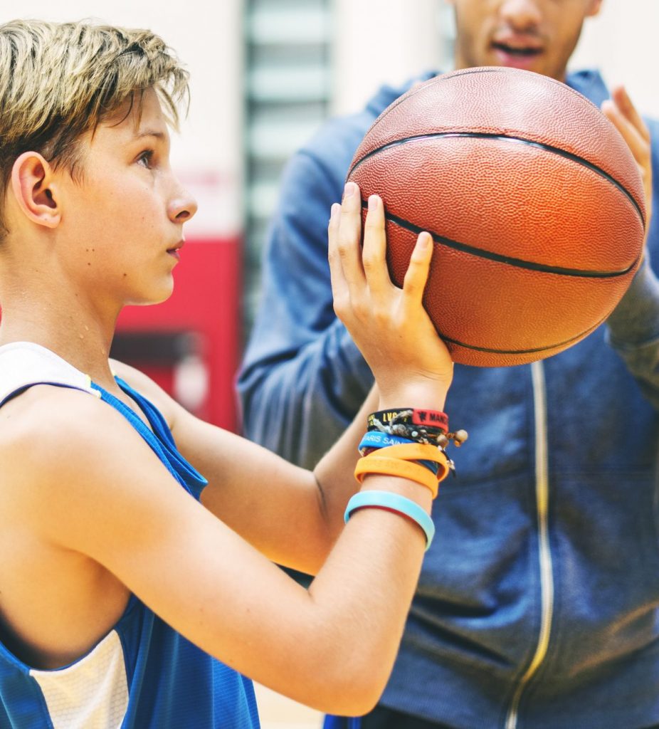 Young kid at basketball practice